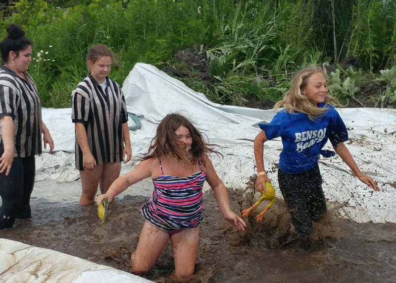 campers playing mud games for mud o mania
